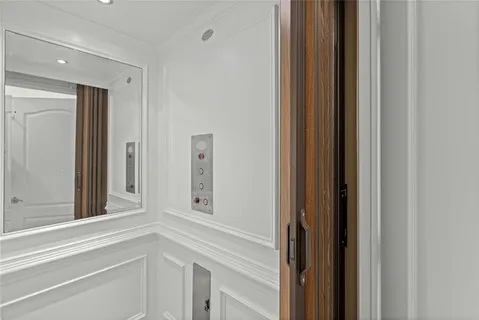 a bathroom with a sink a vanity and a mirror
