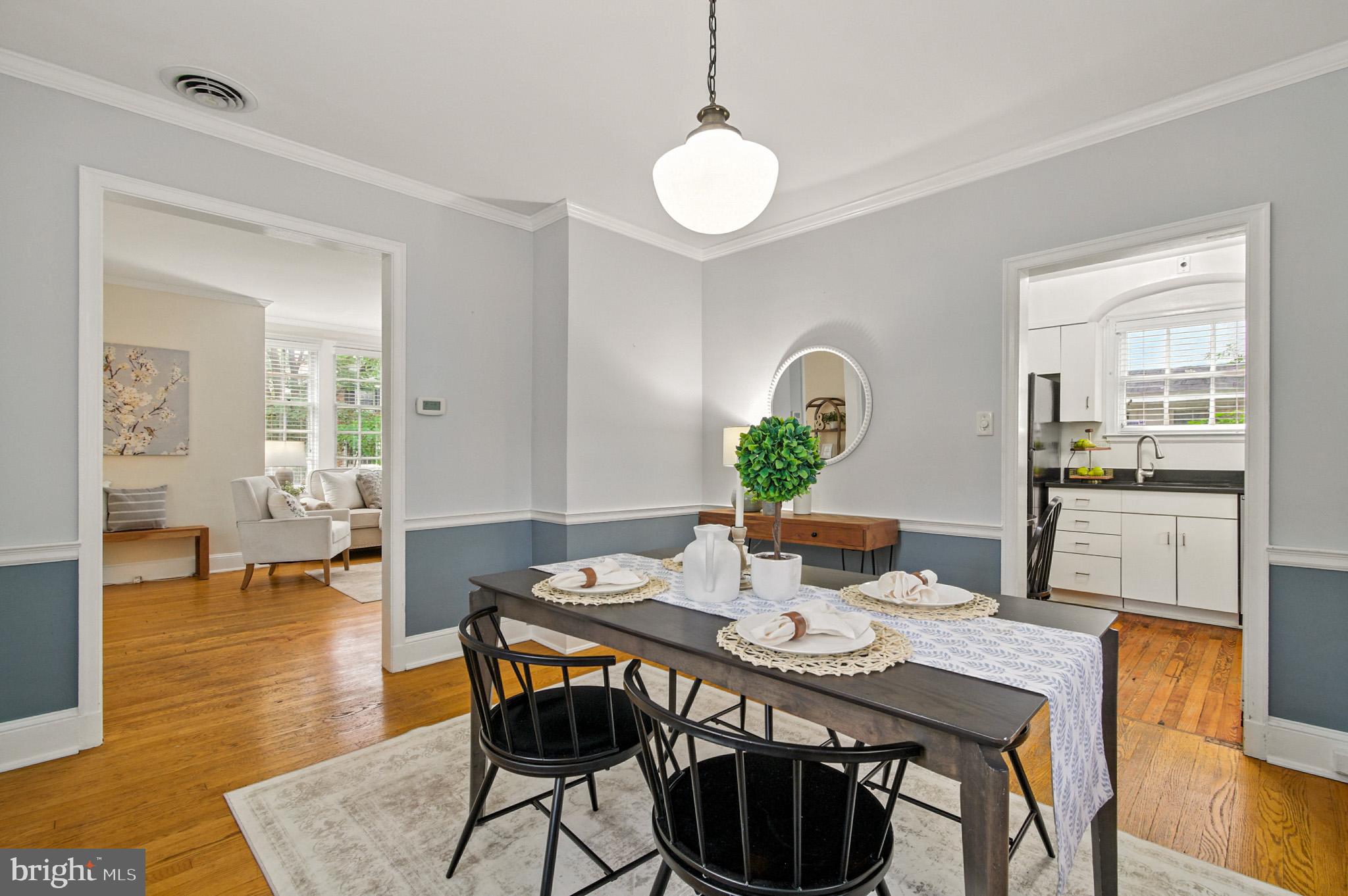 310 Paddington Road Baltimore, MD 21212 - Photo 11 of 59 a view of a dining room with furniture and wooden floor