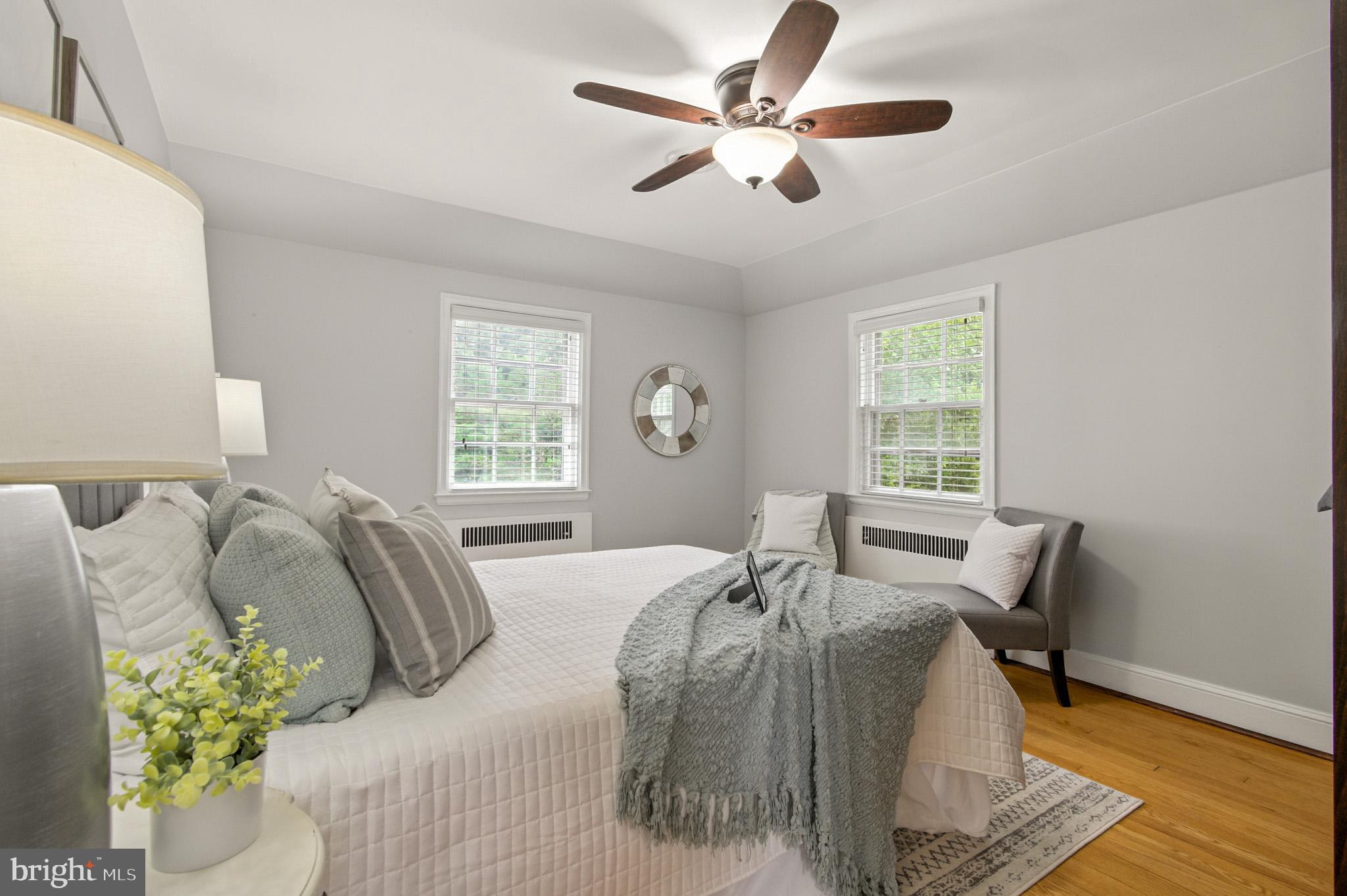 310 Paddington Road Baltimore, MD 21212 - Photo 19 of 59 a bed sitting in a bedroom next to a window