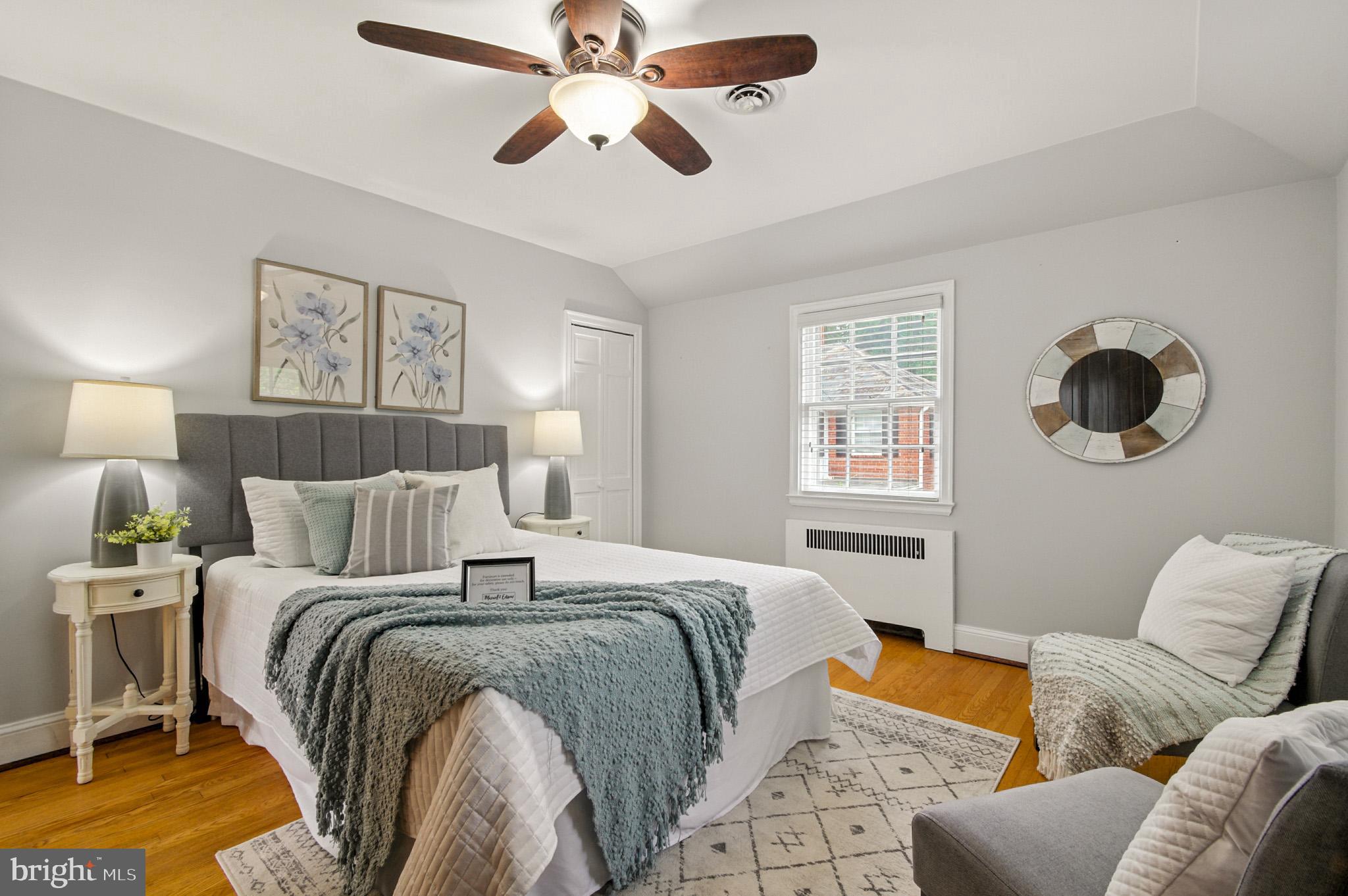 310 Paddington Road Baltimore, MD 21212 - Photo 20 of 59 a bed room with a bed and a couch