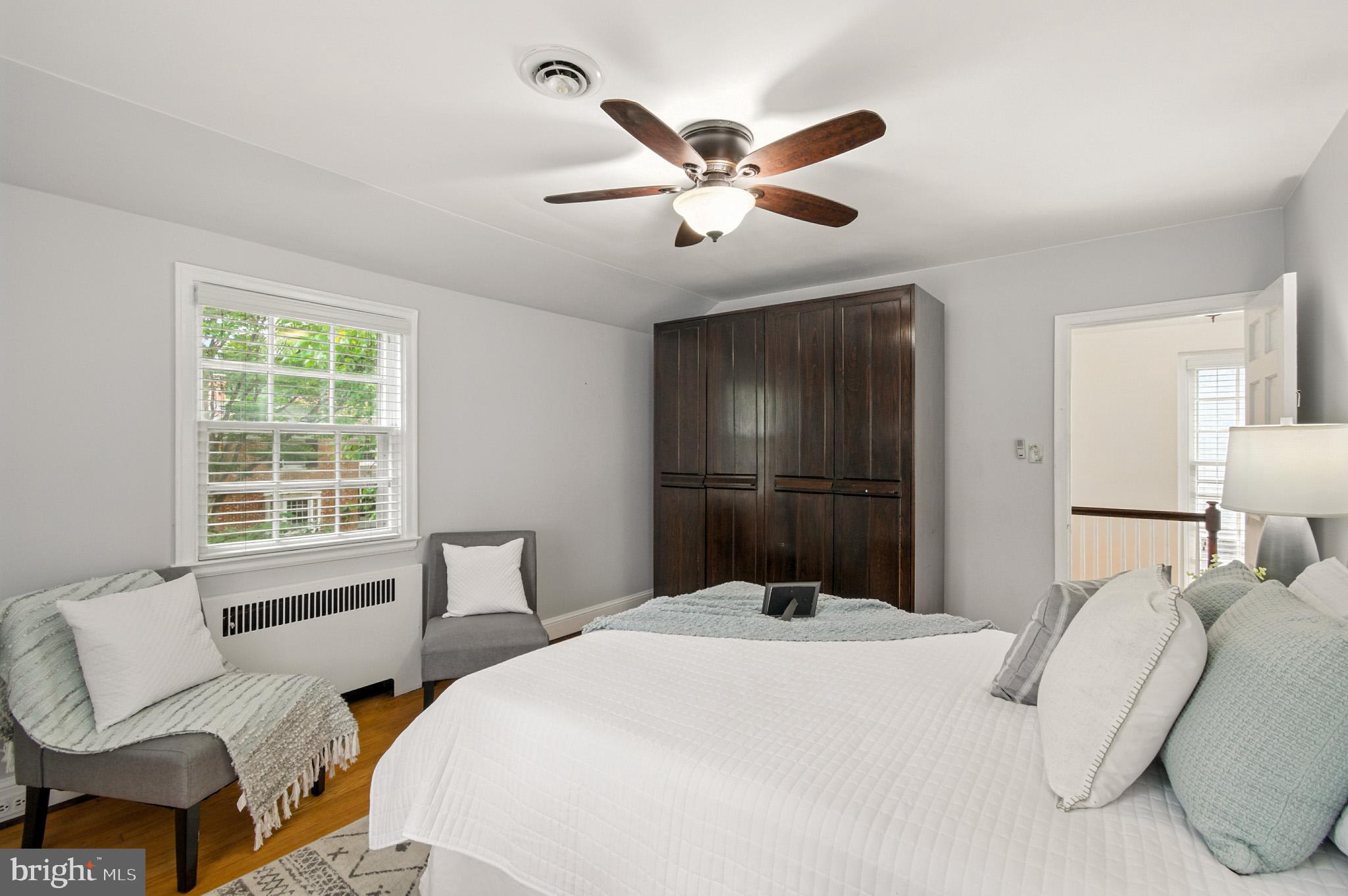 310 Paddington Road Baltimore, MD 21212 - Photo 21 of 59 a bedroom with a large bed and a window