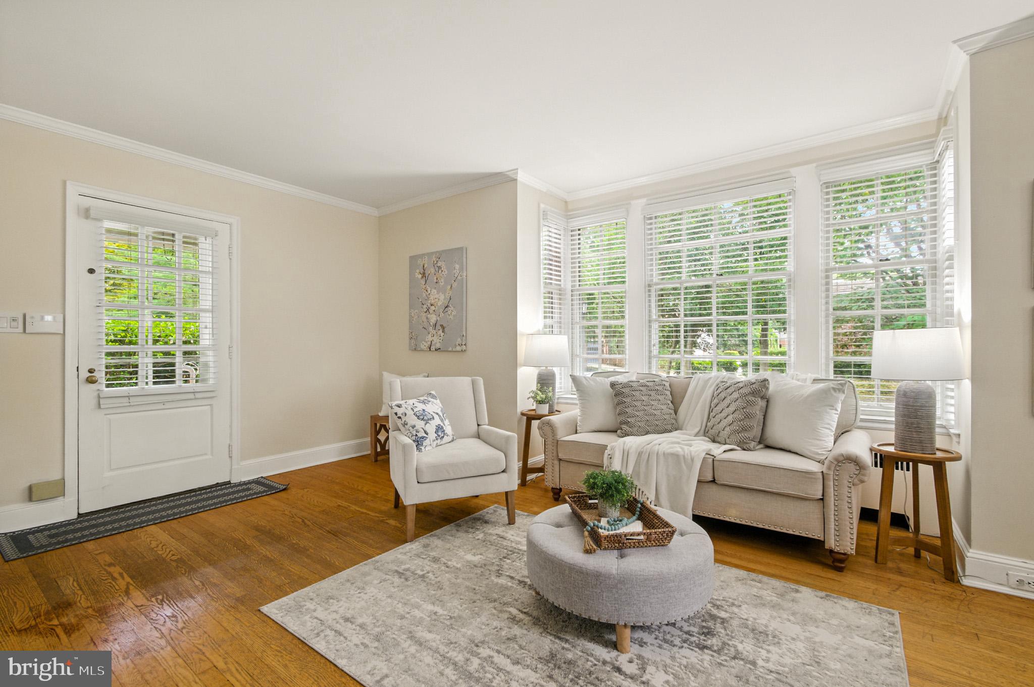 310 Paddington Road Baltimore, MD 21212 - Photo 3 of 59 a living room with furniture and a large window