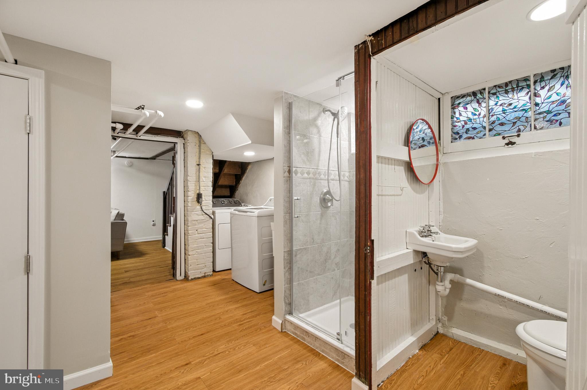 310 Paddington Road Baltimore, MD 21212 - Photo 34 of 59 a view of a hallway with wooden floor and staircase