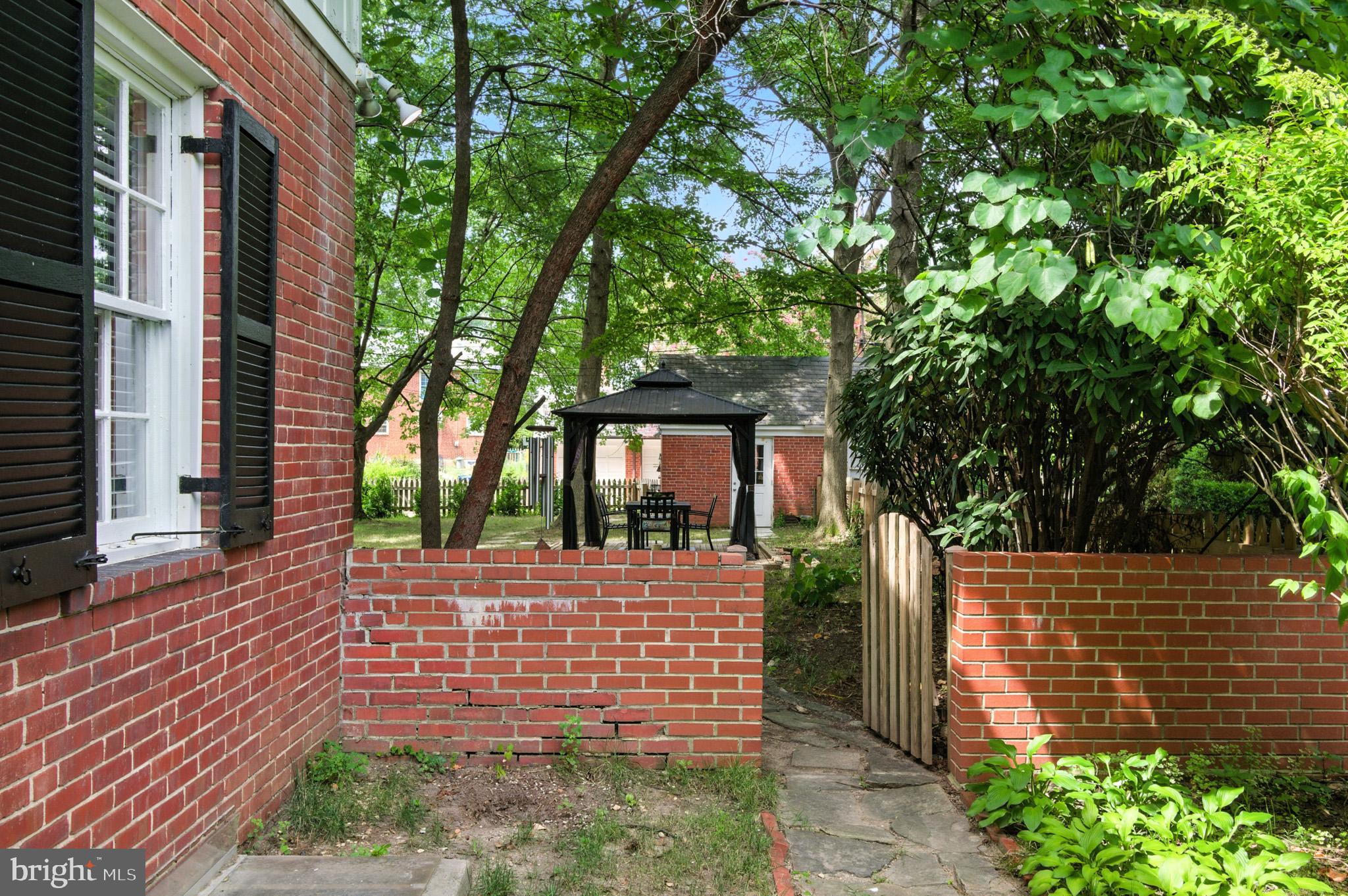 310 Paddington Road Baltimore, MD 21212 - Photo 39 of 59 a front view of a house with a yard