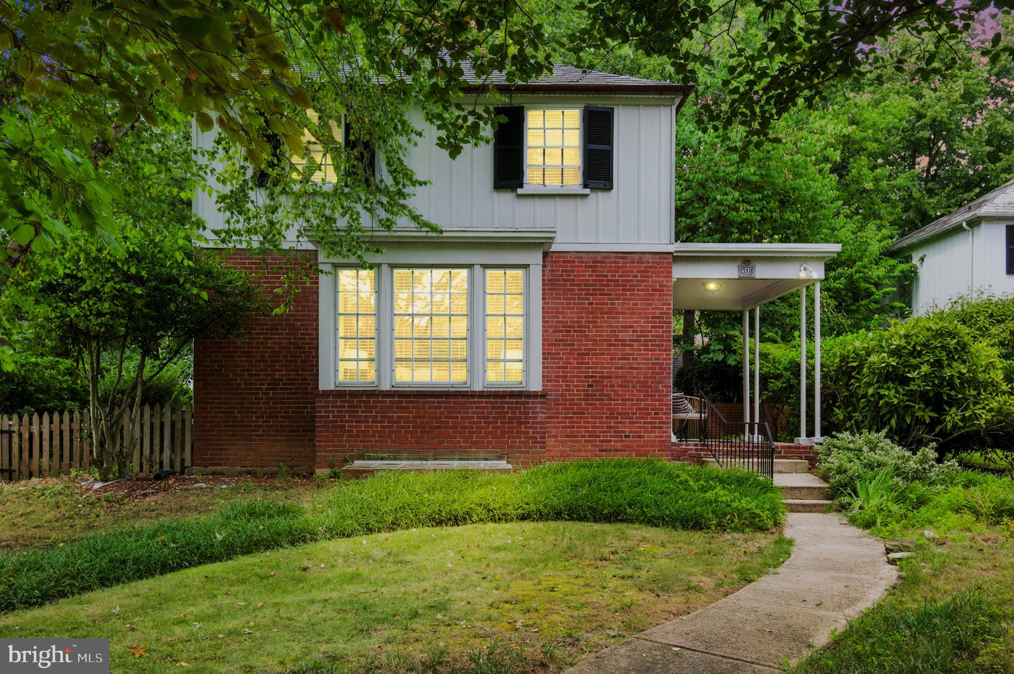 310 Paddington Road Baltimore, MD 21212 - Photo 56 of 59 a front view of a house with garden
