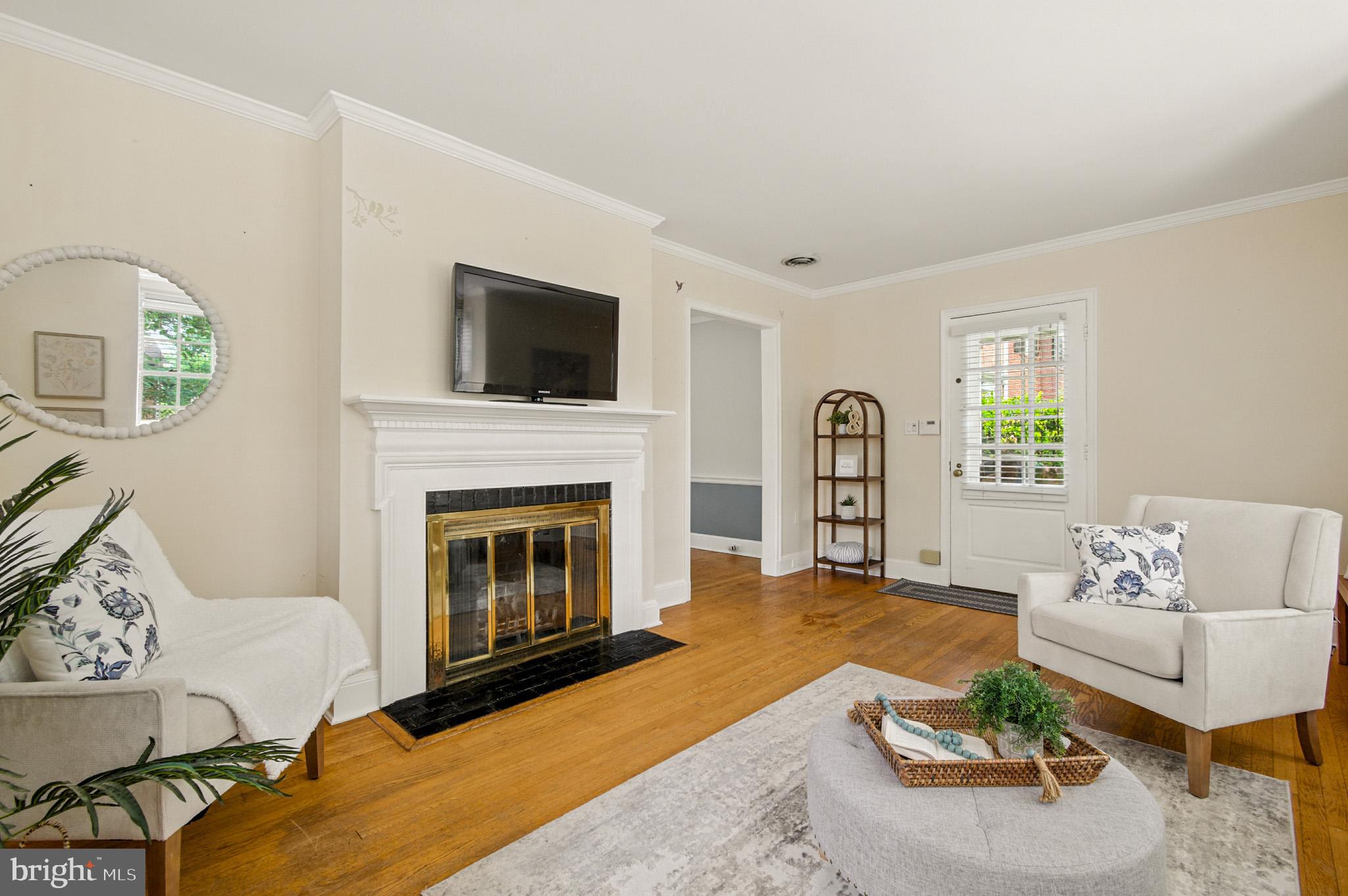 310 Paddington Road Baltimore, MD 21212 - Photo 8 of 59 a living room with furniture and a fireplace