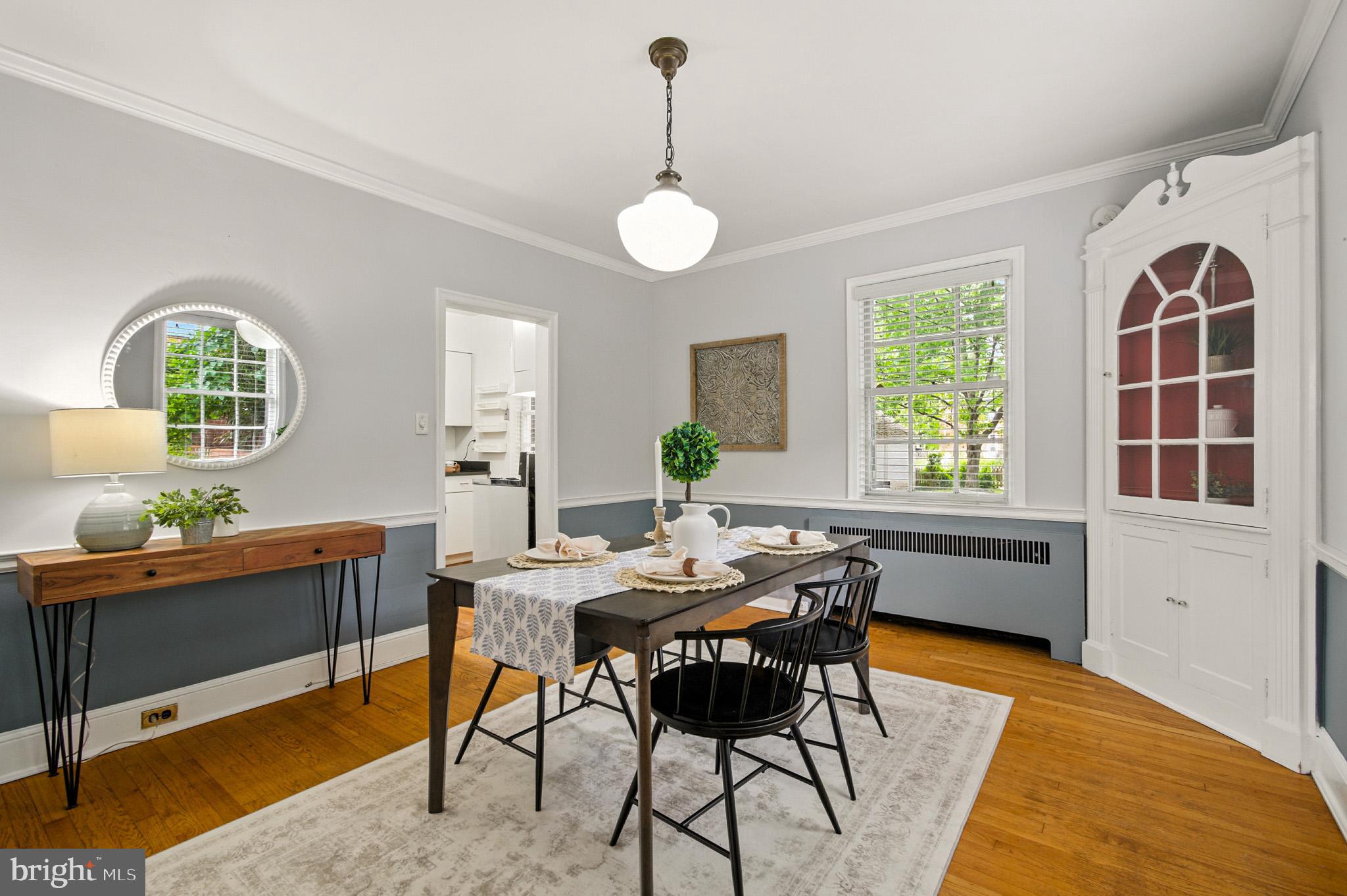 310 Paddington Road Baltimore, MD 21212 - Photo 10 of 59 a view of a dining room with furniture window and wooden floor