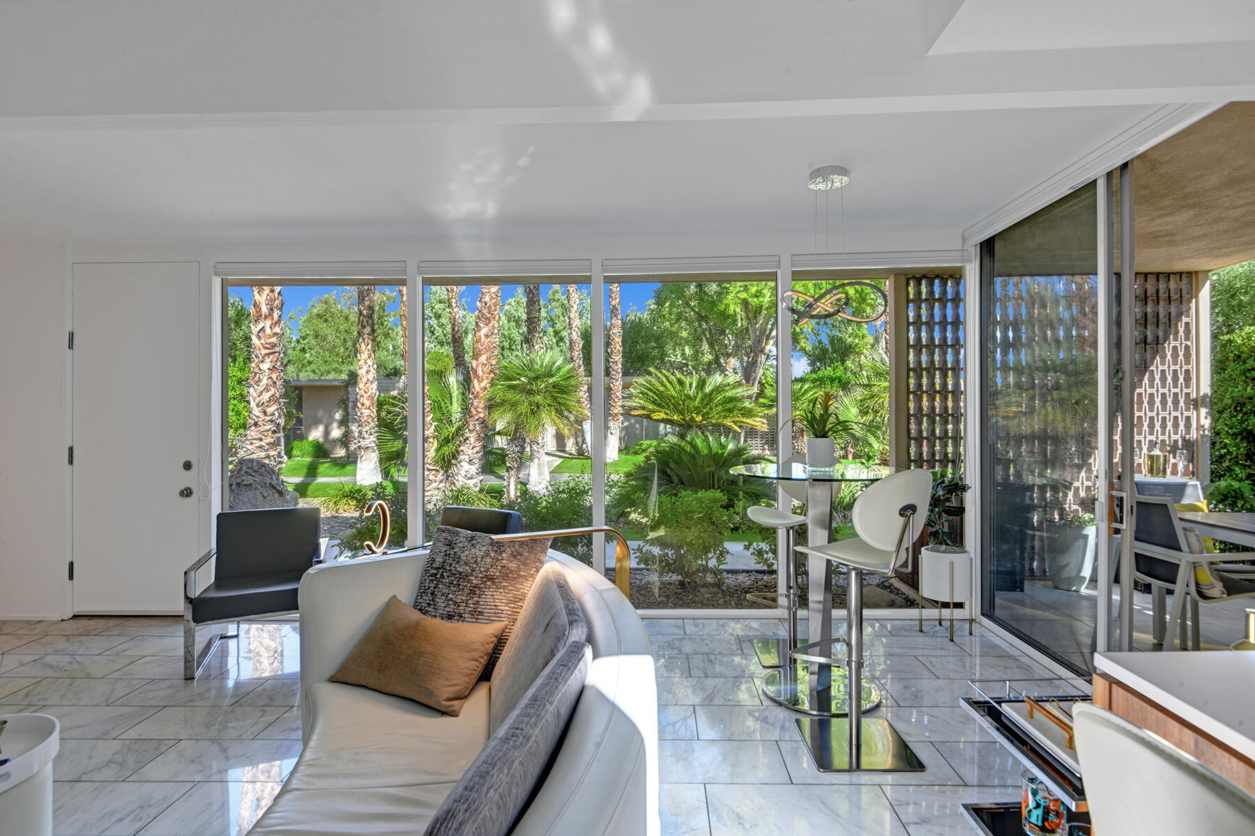 360 Cabrillo Road, Unit 202 Palm Springs, CA 92262 - Photo 18 of 49 OUT LIVING ROOM WINDOWS MLS
