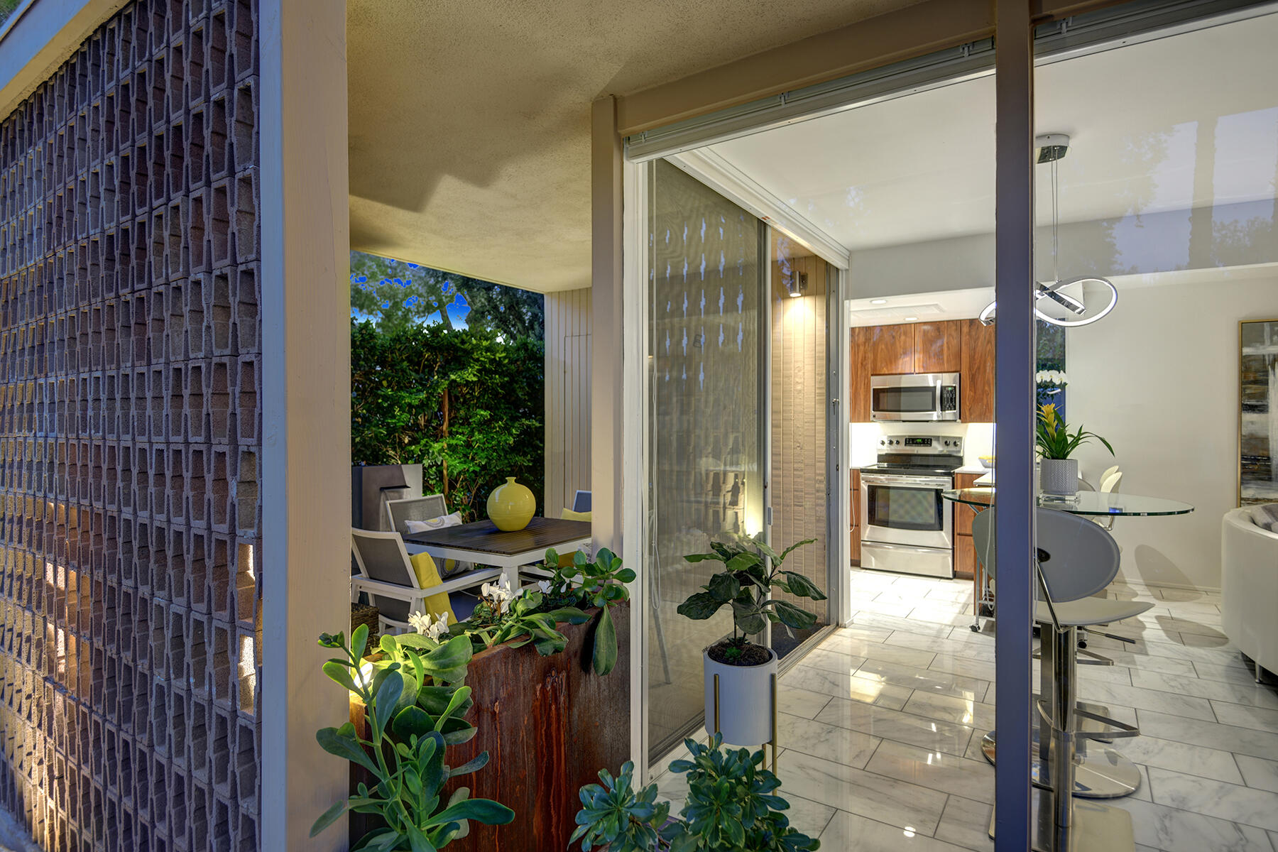 360 Cabrillo Road, Unit 202 Palm Springs, CA 92262 - Photo 45 of 49 FRONT OF UNIT TO PATIO DETAIL NIGHT MLS