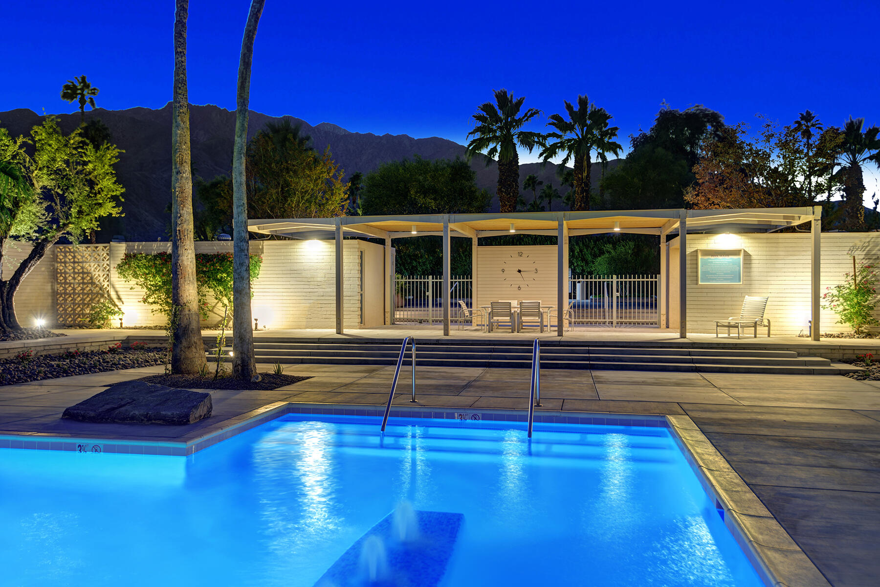 360 Cabrillo Road, Unit 202 Palm Springs, CA 92262 - Photo 6 of 49 POOL TO CLOCK AND MOUNTAINS NIGHT MLS