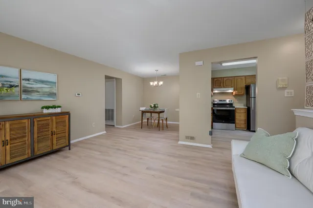 a view of a kitchen with furniture and a kitchen