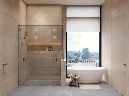 a bathroom with a bathtub and shower