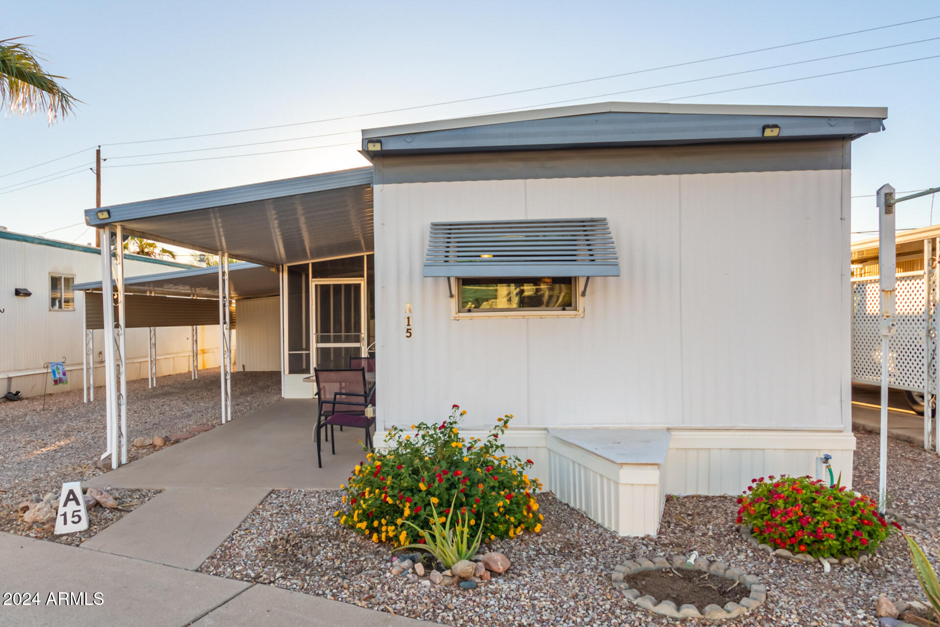 44 South Hawes Road, Unit A15 Mesa, AZ 85208 - Photo 1 of 40 a view of a house with a outdoor space