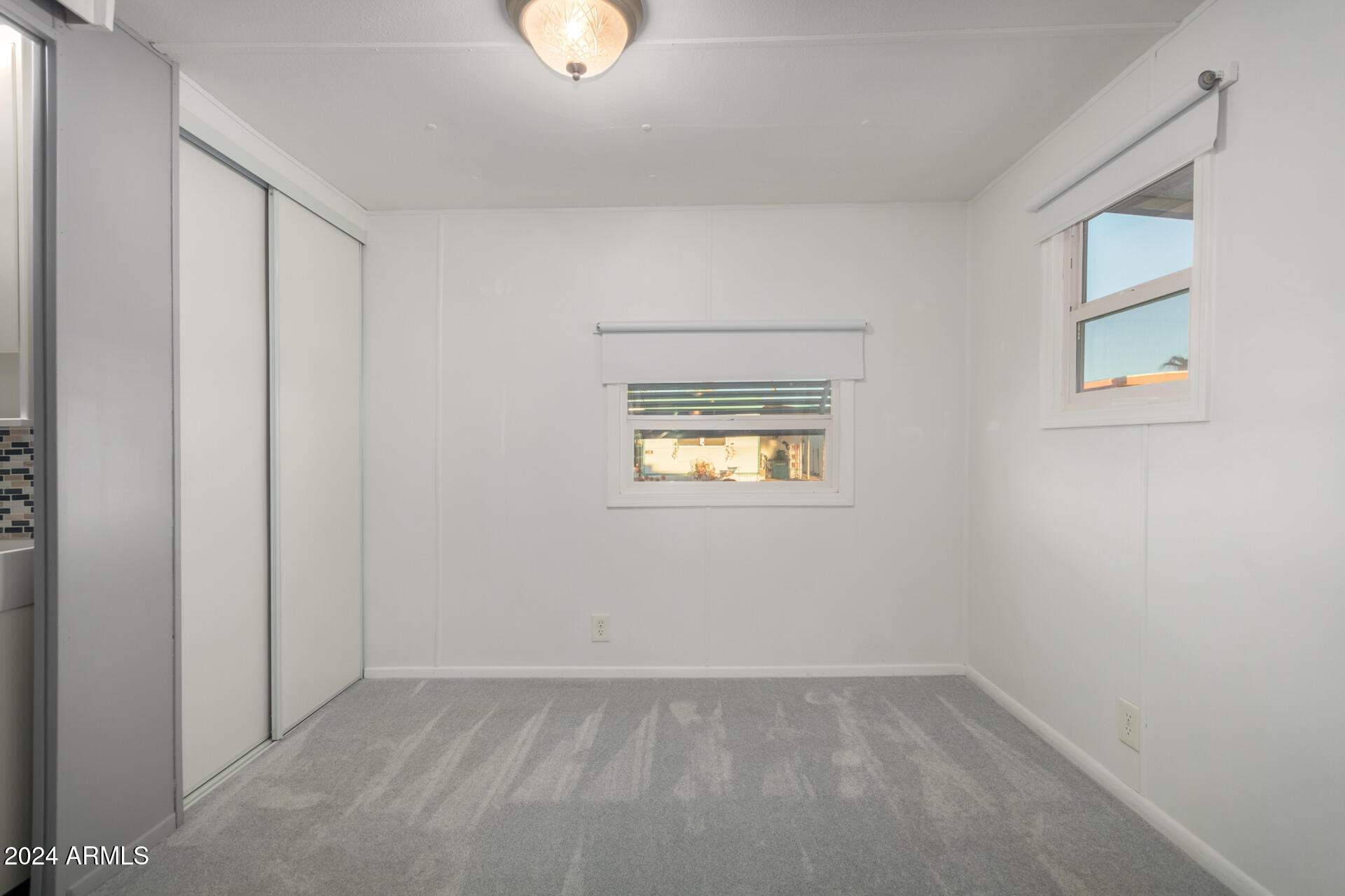 44 South Hawes Road, Unit A15 Mesa, AZ 85208 - Photo 20 of 40 an empty room with windows