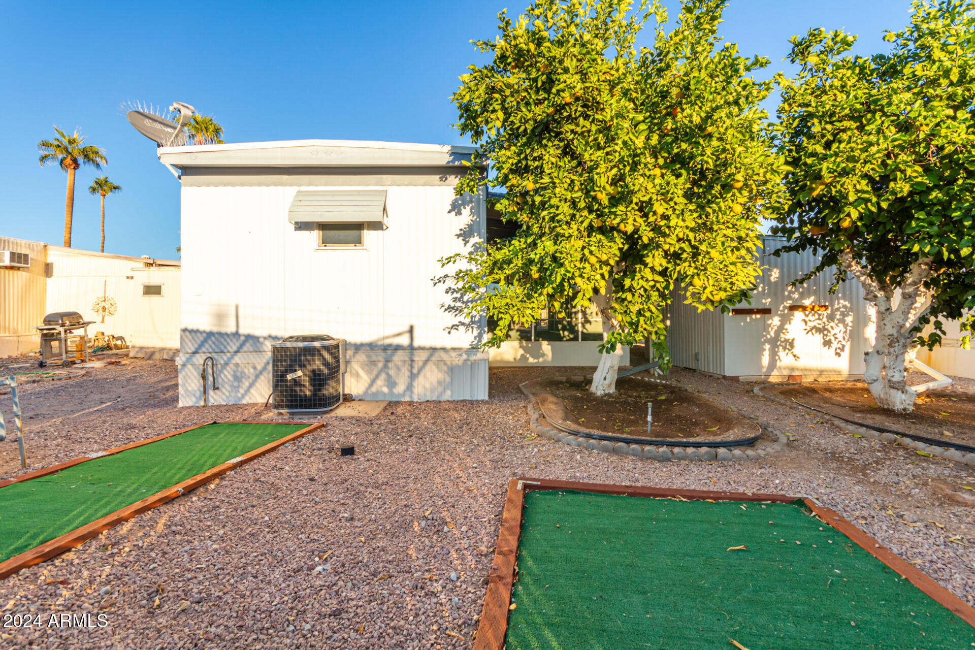 44 South Hawes Road, Unit A15 Mesa, AZ 85208 - Photo 39 of 40 a view of outdoor space yard and tree