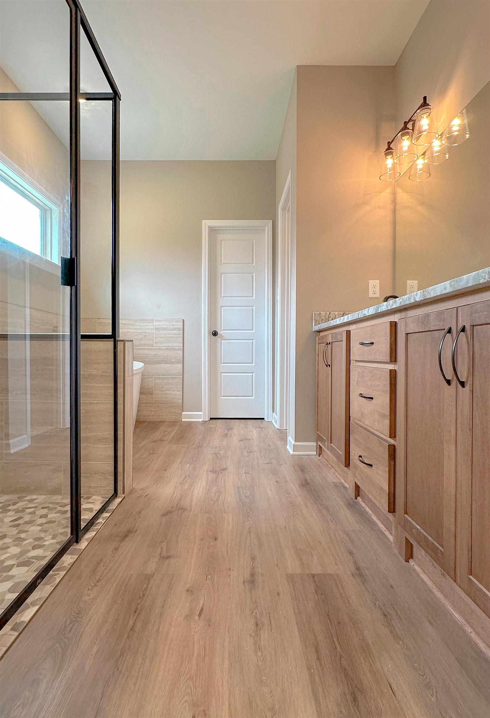 126 Stewart Road Munford, TN 38058 - Photo 14 of 23 Bathroom featuring vanity and wood-type flooring