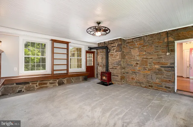 an empty room with windows