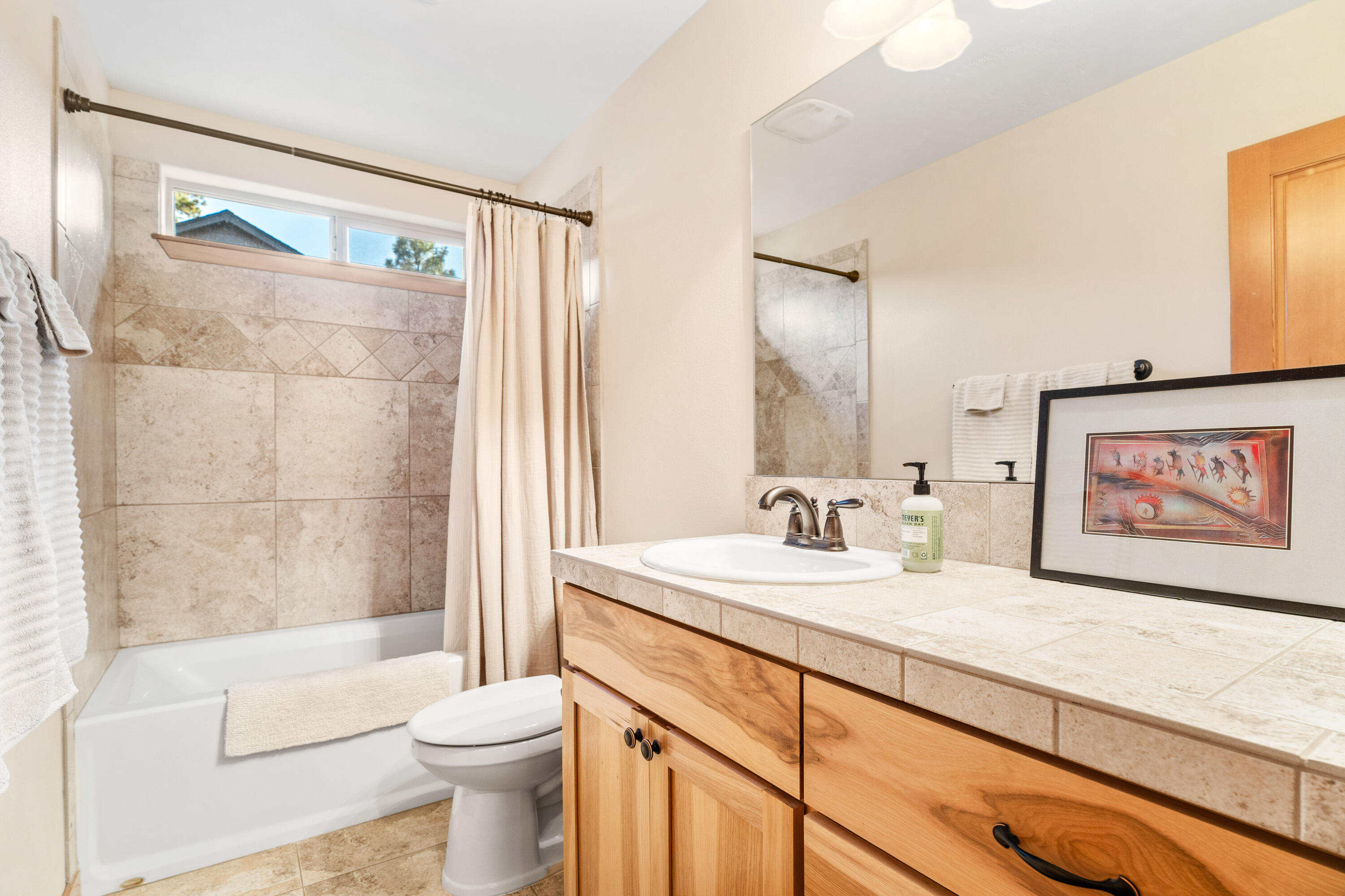 19031 Baker Road Bend, OR 97702 - Photo 19 of 35 a bathroom with a sink a toilet and shower