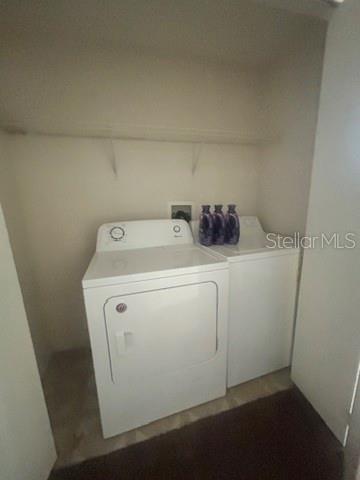5616 Pinnacle Heights Circle, Unit 302 Tampa, FL 33624 - Photo 11 of 12 a utility room with dryer and washer