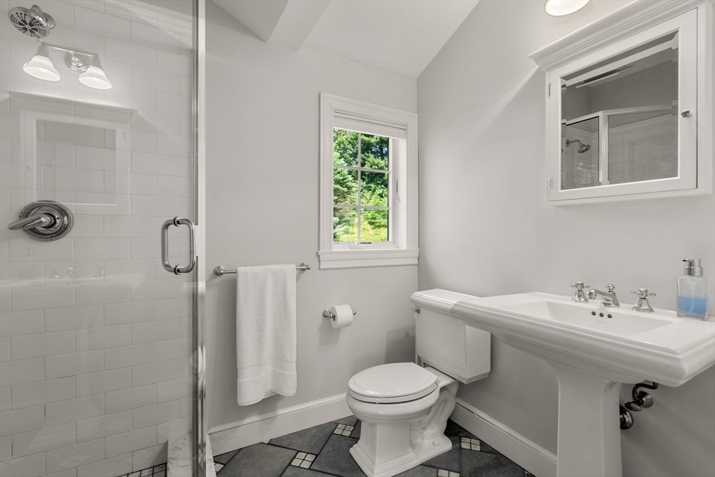 40 York Road Wayland, MA 01778 - Photo 33 of 37 a bathroom with a sink toilet and shower