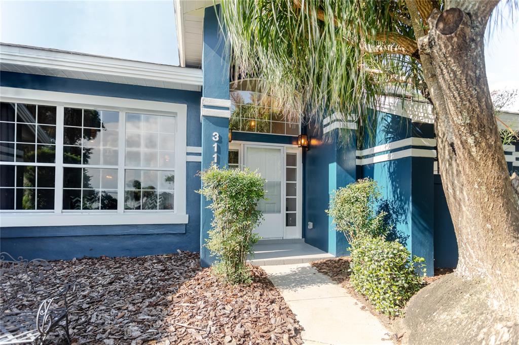 3111 Indian Trail Eustis, FL 32726 - Photo 1 of 29 a front view of a house