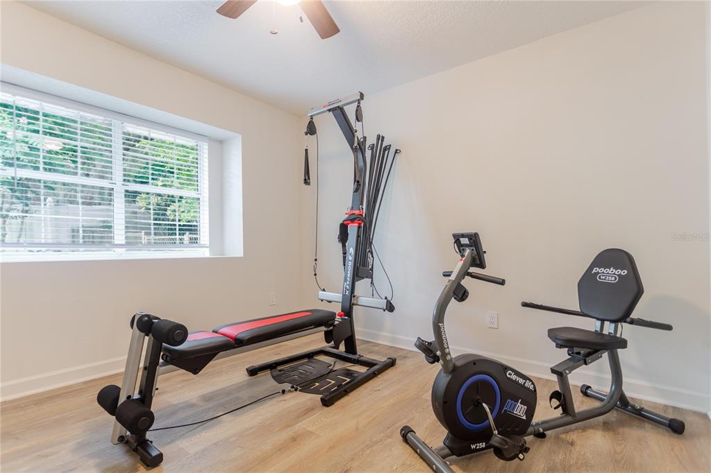 3111 Indian Trail Eustis, FL 32726 - Photo 23 of 29 a room with gym equipment