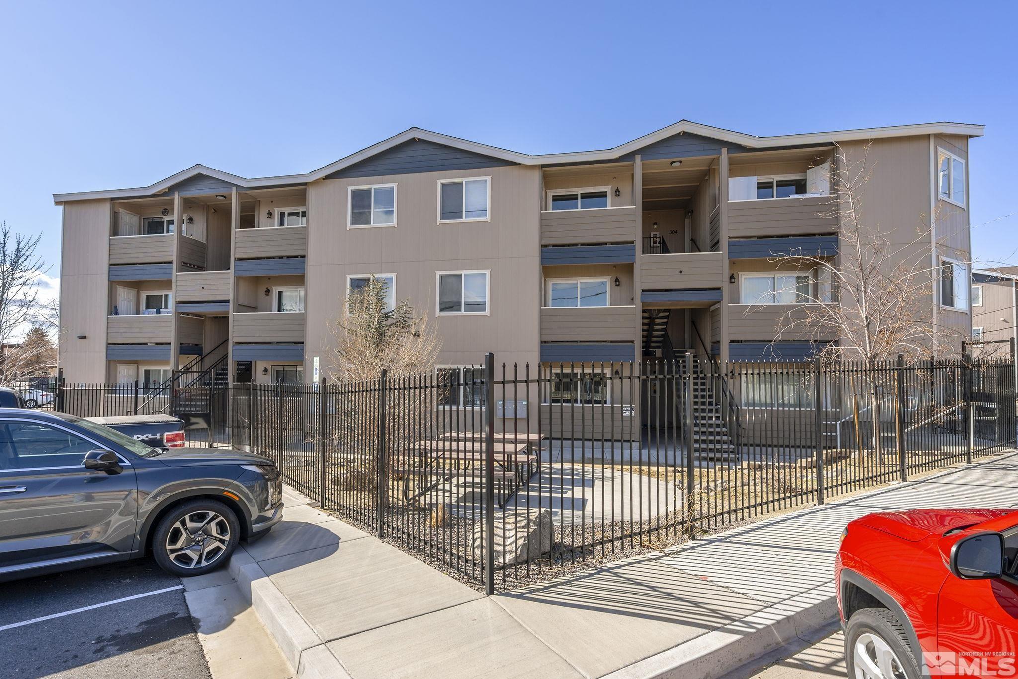 15 Gentry Way, Unit 12 Reno, NV 89502 - Photo 4 of 19 a front view of a house with parking space