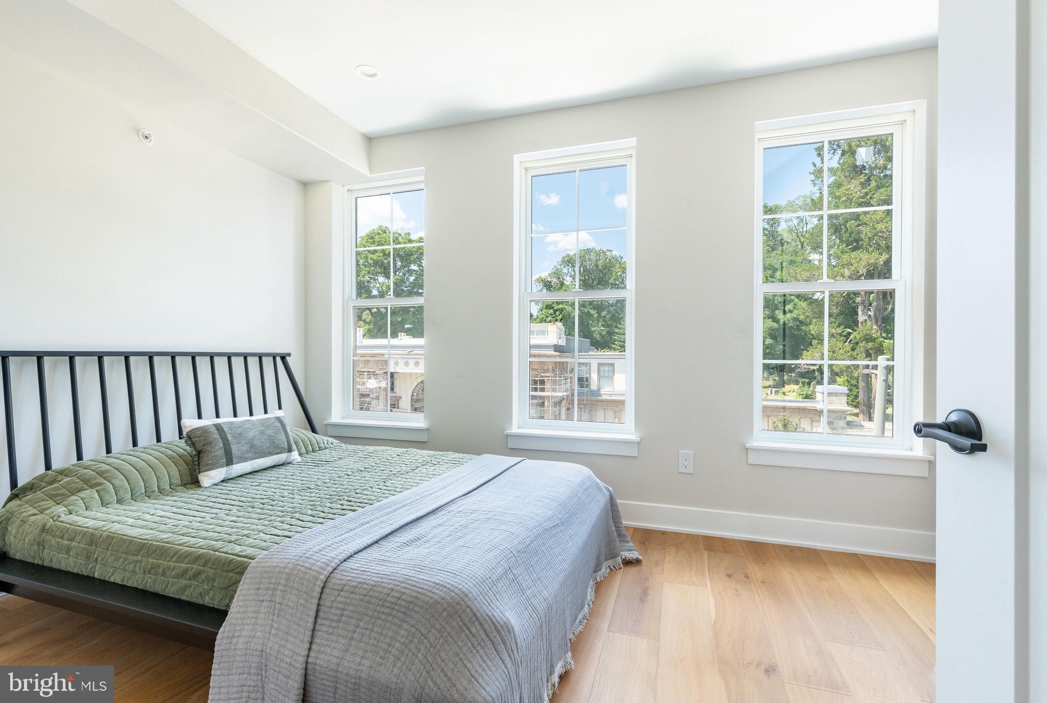 3843 Ridge Avenue Philadelphia, PA 19132 - Photo 17 of 33 a bedroom with a bed and a window