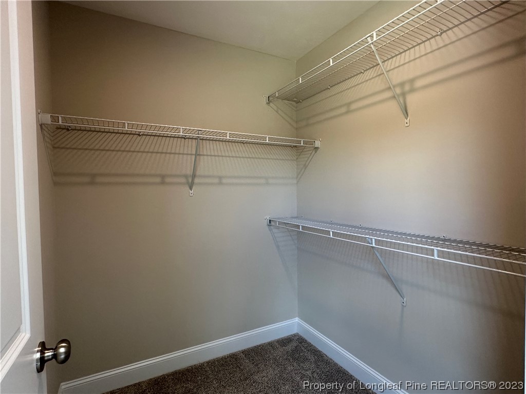 2526 Sand Hill Road Fayetteville, NC 28306 - Photo 29 of 40 a view of a room with racks on the wall