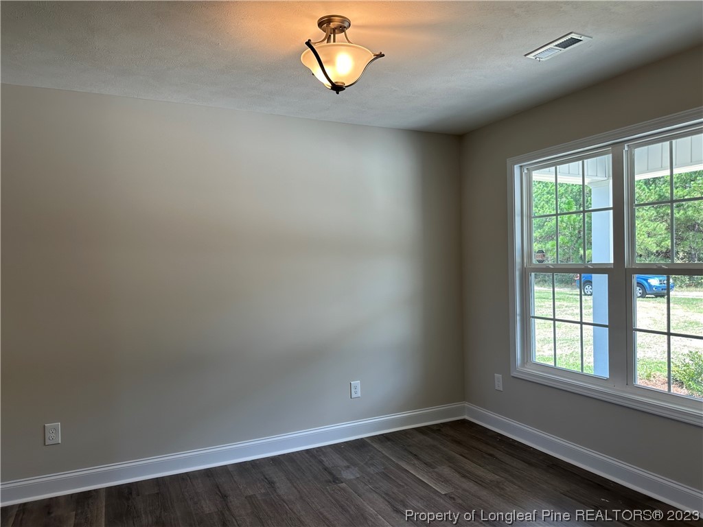 2526 Sand Hill Road Fayetteville, NC 28306 - Photo 5 of 40 an empty room with a window