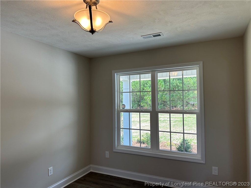 2526 Sand Hill Road Fayetteville, NC 28306 - Photo 6 of 40 a view of a livingroom with a window