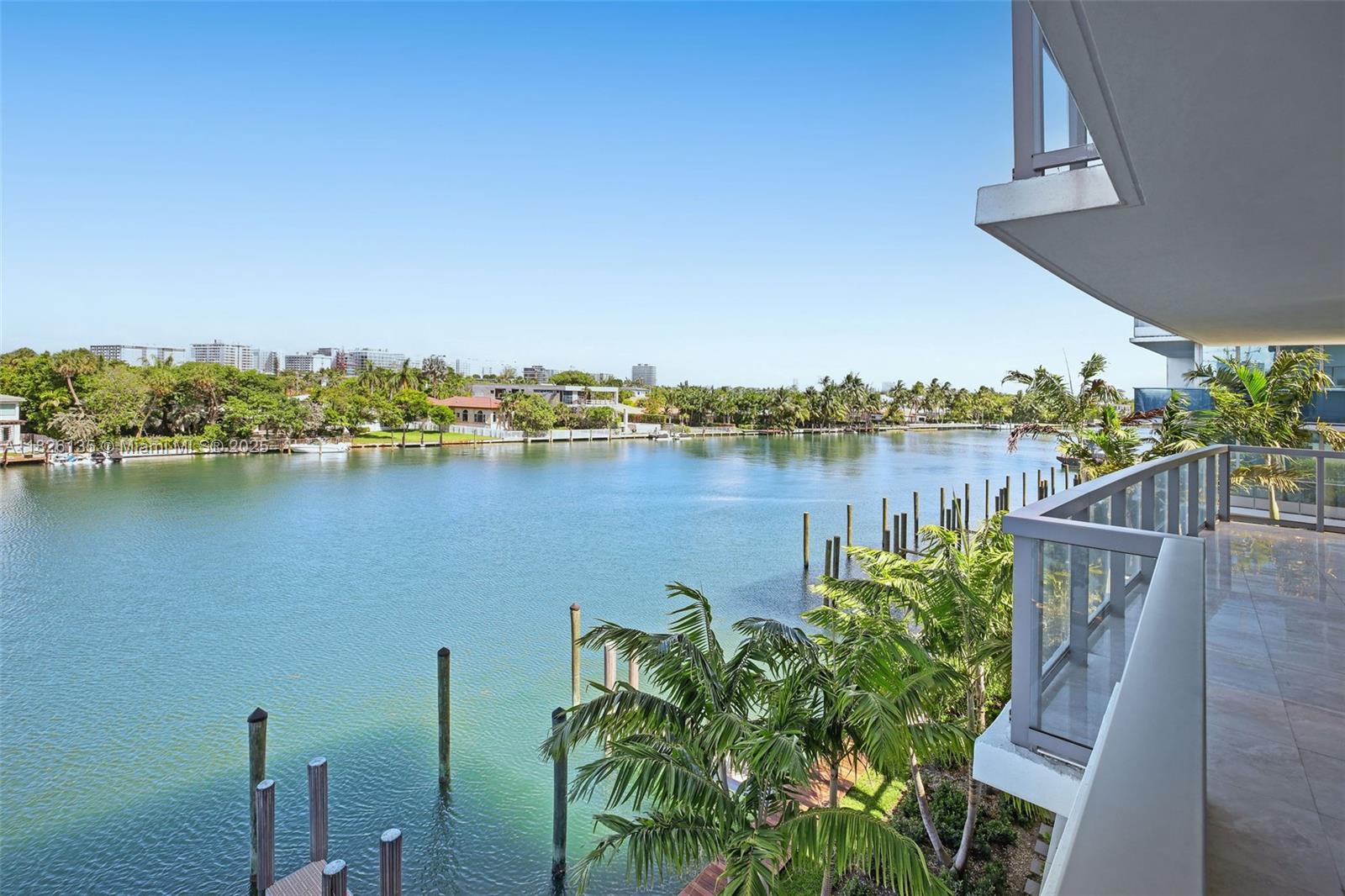 9261 East Bay Harbor Drive, Unit 404 Bay Harbor Islands, FL 33154 - Photo 15 of 49 a view of a lake with a outdoor space