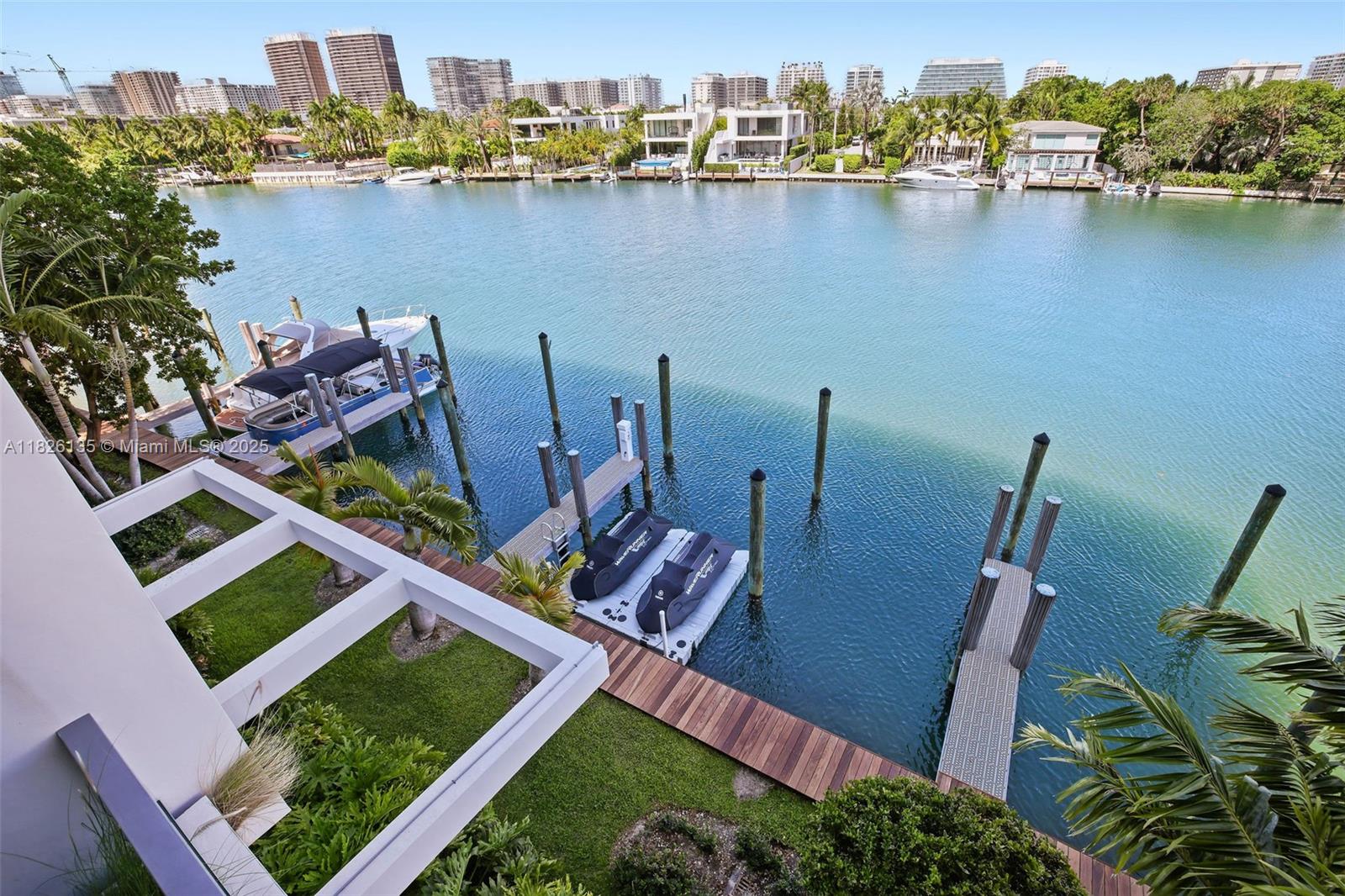 9261 East Bay Harbor Drive, Unit 404 Bay Harbor Islands, FL 33154 - Photo 22 of 49 an aerial view of a house with a lake view