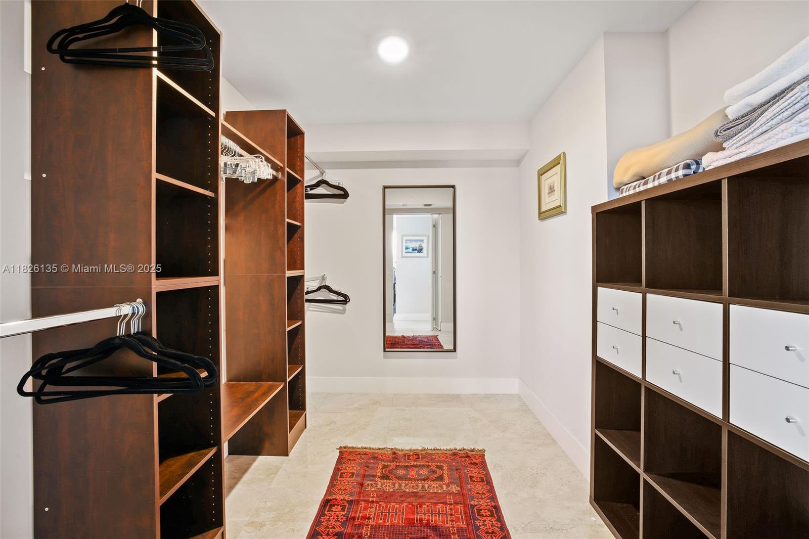 9261 East Bay Harbor Drive, Unit 404 Bay Harbor Islands, FL 33154 - Photo 31 of 49 a hallway with closet