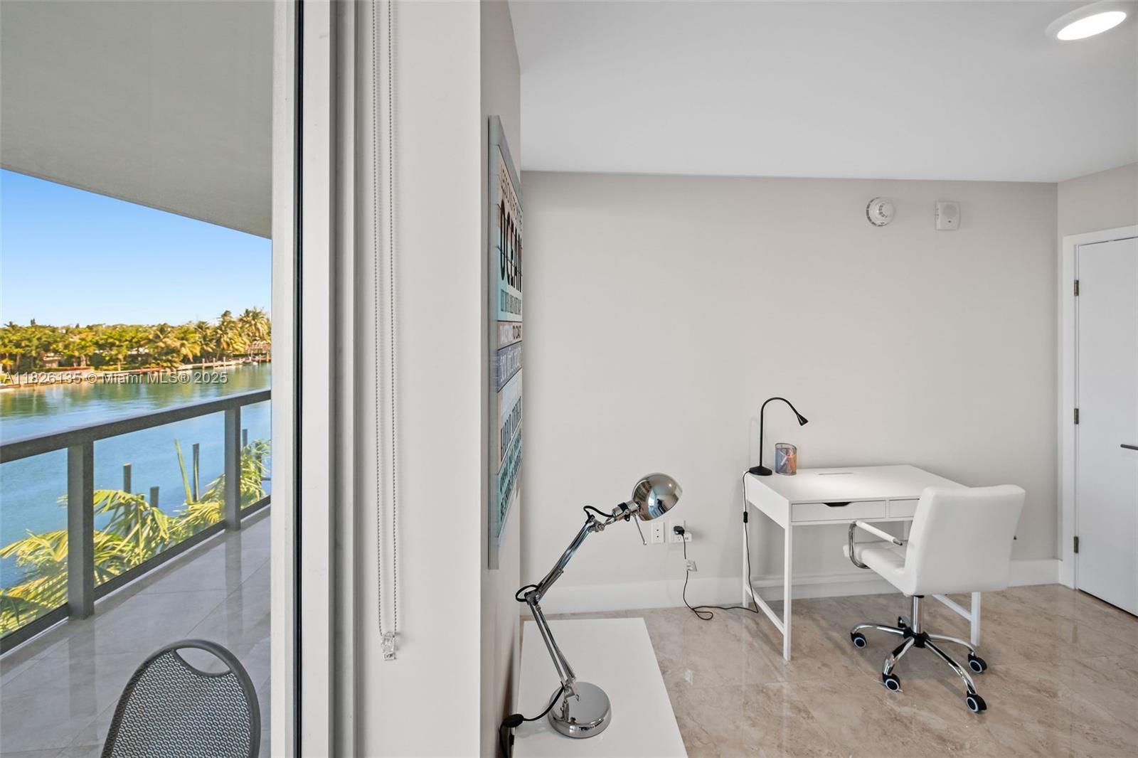 9261 East Bay Harbor Drive, Unit 404 Bay Harbor Islands, FL 33154 - Photo 34 of 49 a bathroom with a sink and mirror