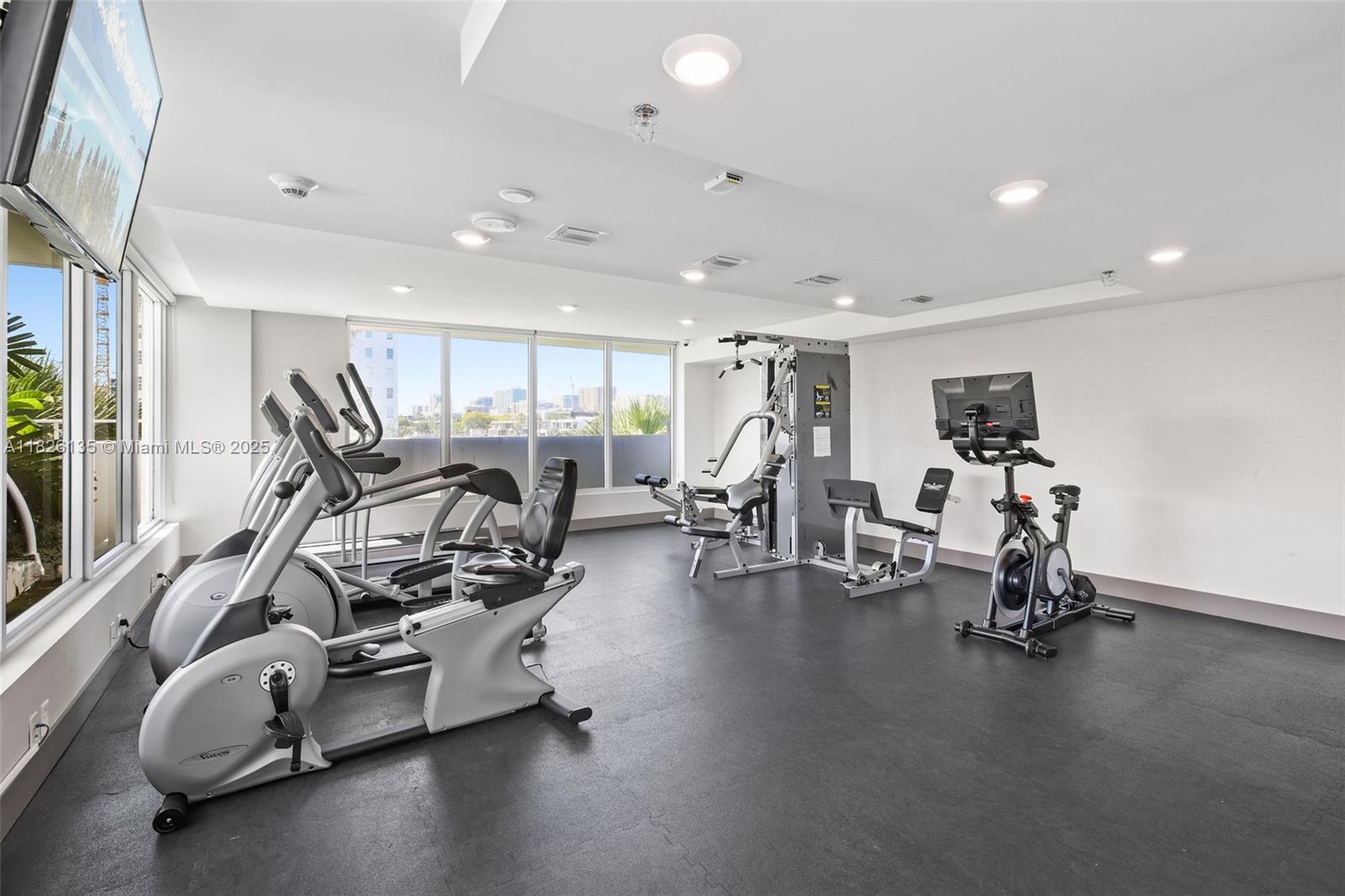 9261 East Bay Harbor Drive, Unit 404 Bay Harbor Islands, FL 33154 - Photo 39 of 49 a view of a room with gym equipment
