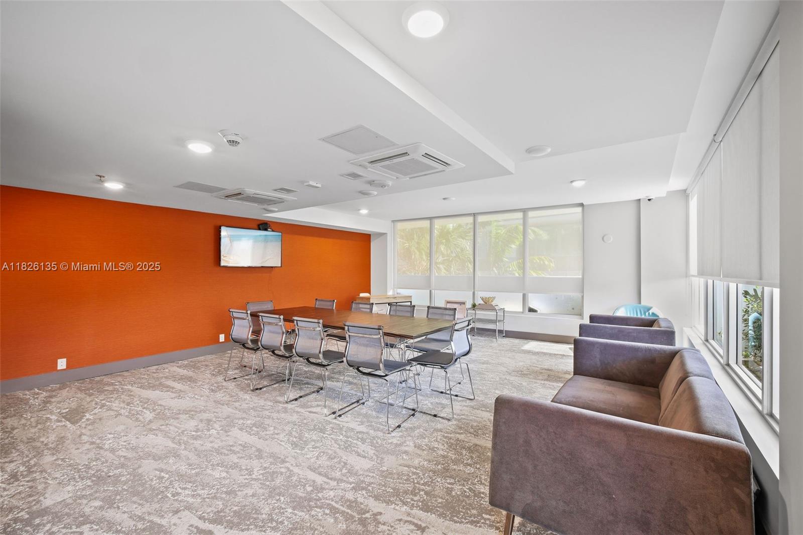 9261 East Bay Harbor Drive, Unit 404 Bay Harbor Islands, FL 33154 - Photo 41 of 49 a living room with furniture potted plant and a large window