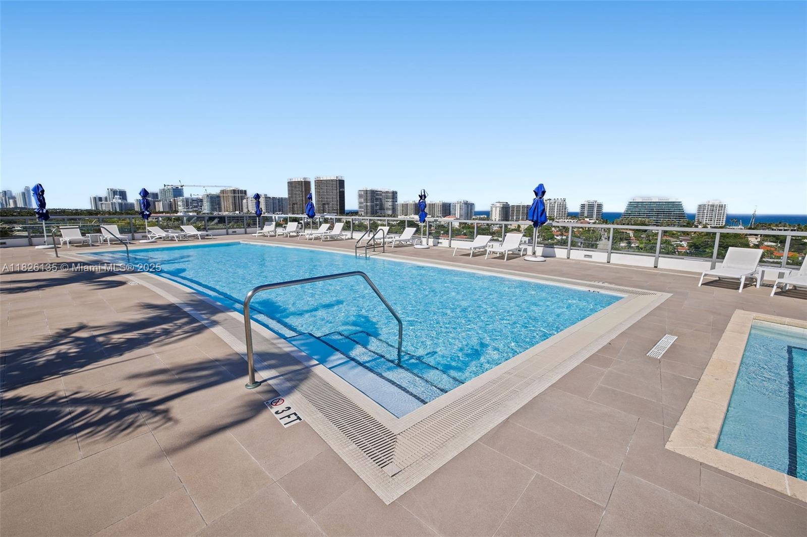9261 East Bay Harbor Drive, Unit 404 Bay Harbor Islands, FL 33154 - Photo 46 of 49 a view of a swimming pool with a terrace