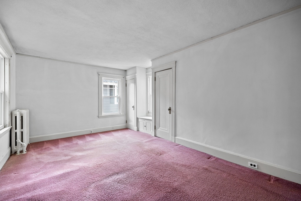 69 Horace Road Belmont, MA 02478 - Photo 18 of 27 an empty room with windows