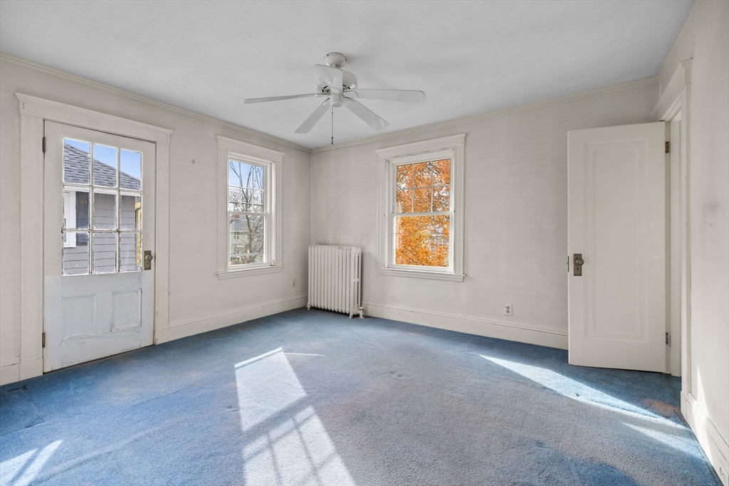69 Horace Road Belmont, MA 02478 - Photo 19 of 27 a view of an empty room with a window