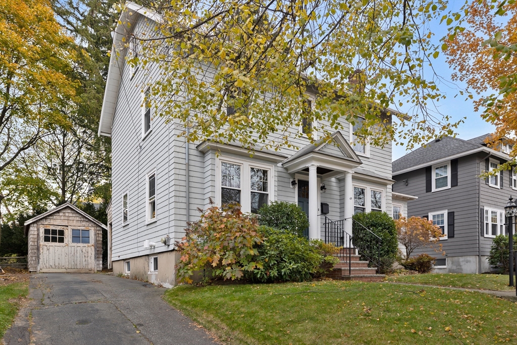 69 Horace Road Belmont, MA 02478 - Photo 2 of 27 front view of a house with a yard