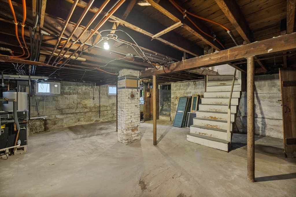 69 Horace Road Belmont, MA 02478 - Photo 22 of 27 a view of empty room with wooden ceiling