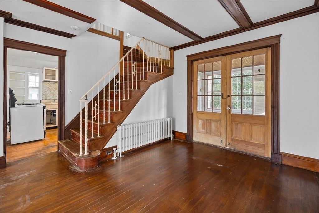 69 Horace Road Belmont, MA 02478 - Photo 8 of 27 a view of an entryway with wooden floor