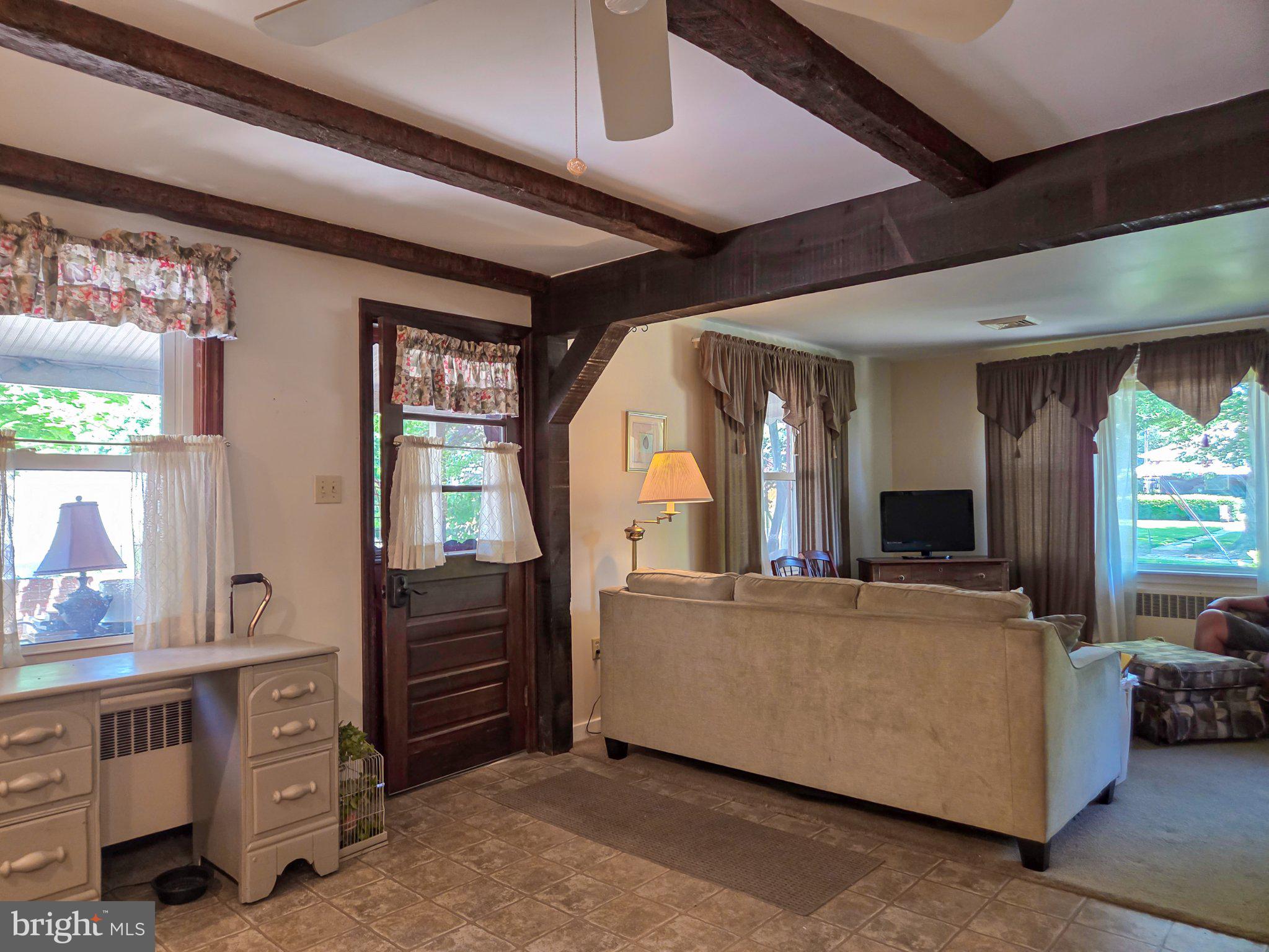 524 Locust Street Denver, PA 17517 - Photo 15 of 36 Charming living space with rustic beams.