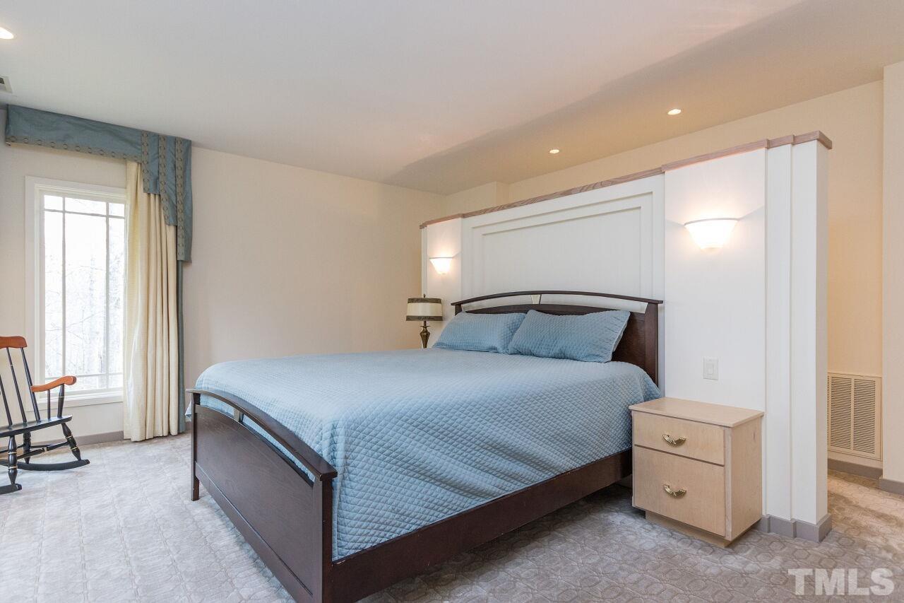 2 Pine Top Place Durham, NC 27705 - Photo 25 of 50 a bedroom with a bed and a window