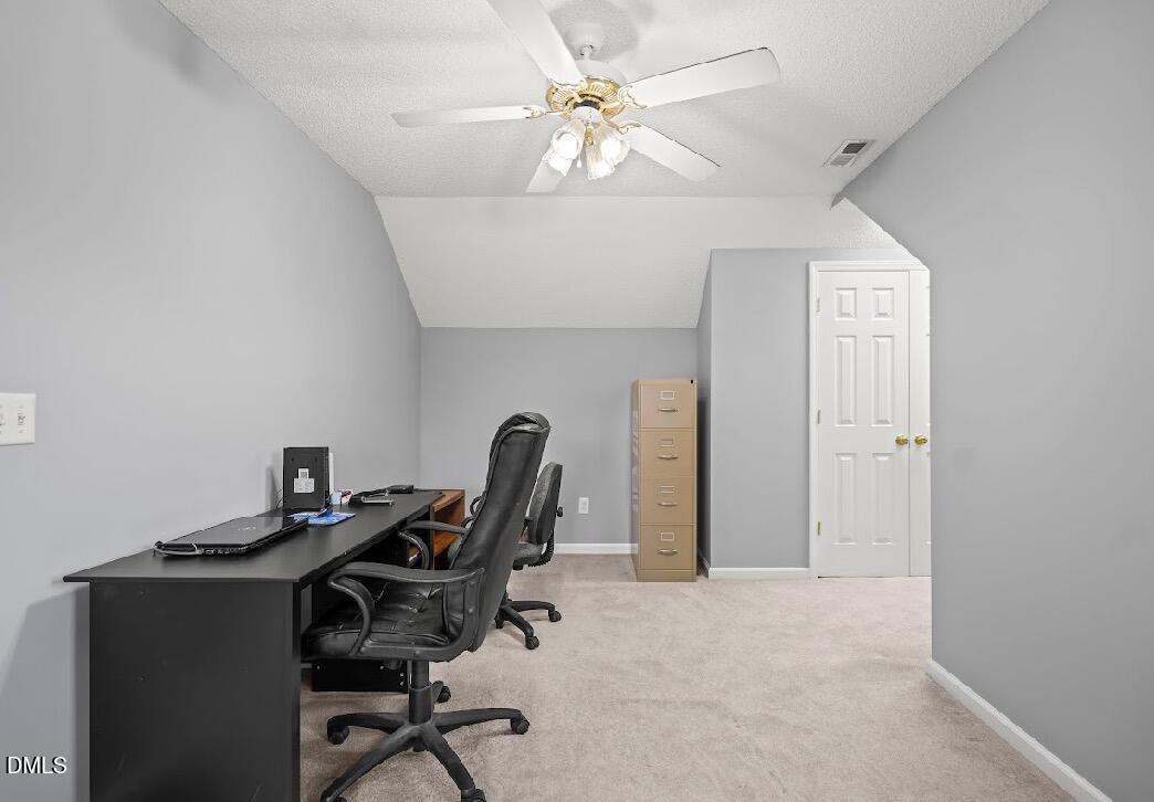 5780 McArthur Road Broadway, NC 27505 - Photo 31 of 40 a view of a workspace with furniture and a window