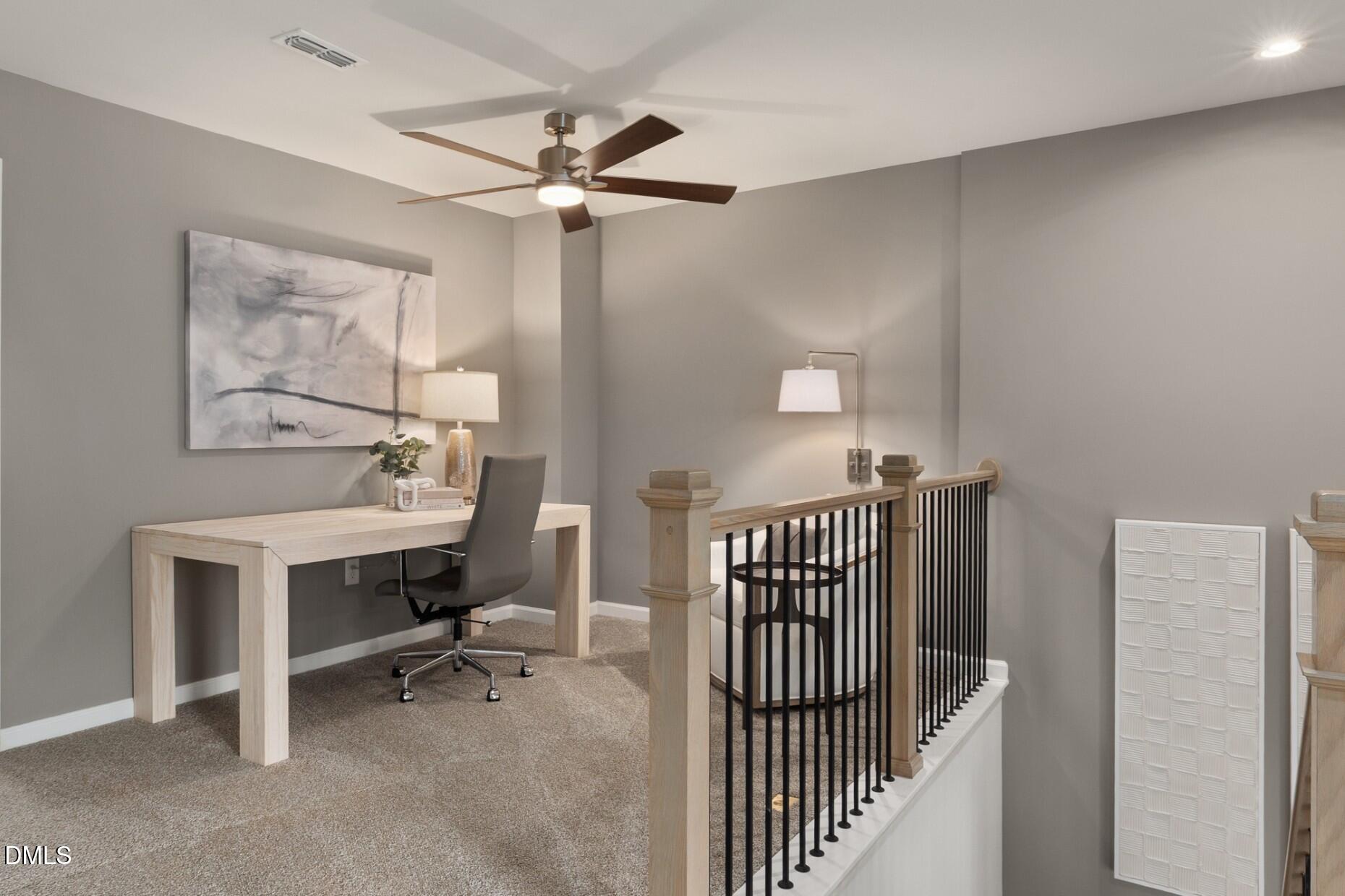 2901 Denson Road Fuquay-Varina, NC 27526 - Photo 16 of 31 a view of a workspace with furniture and a window