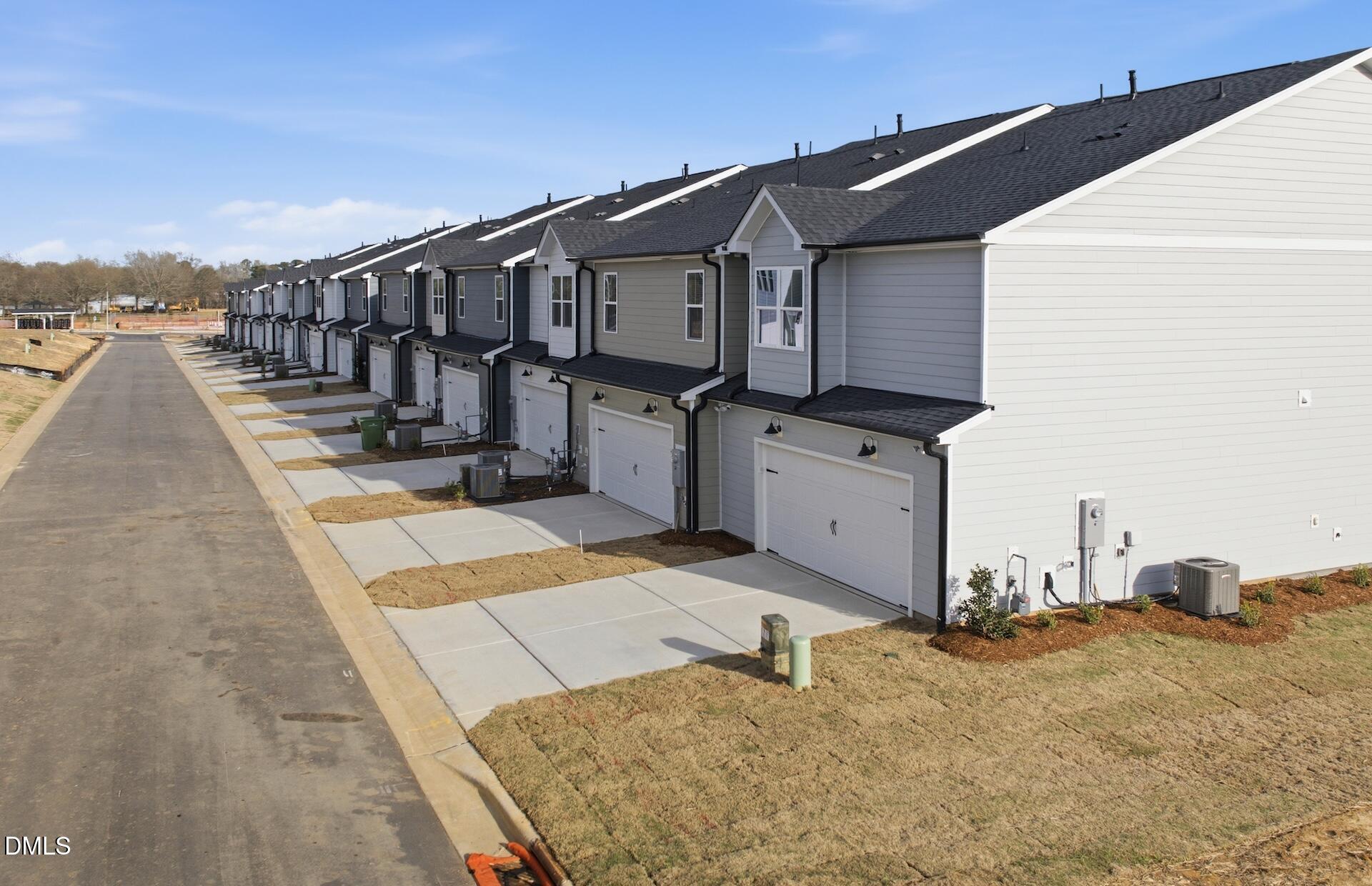 2901 Denson Road Fuquay-Varina, NC 27526 - Photo 24 of 31 a view of a house with wooden fence