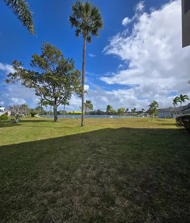 a view of a golf course with a lake