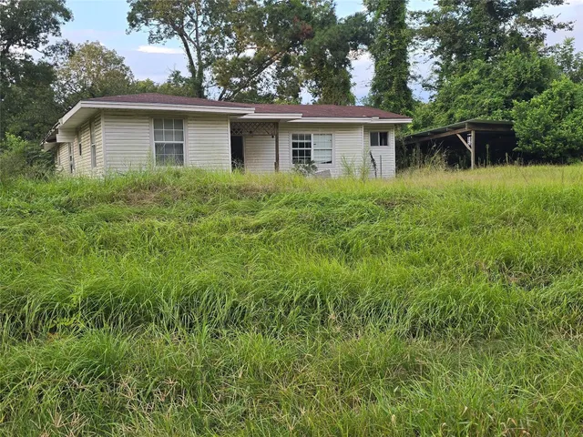 a house view with a outdoor space